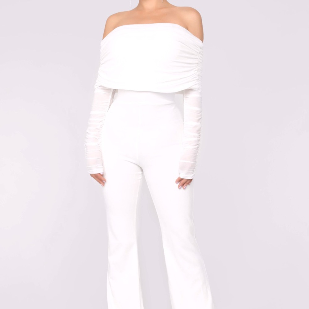 Short sleeved white flare leg jumpsuit